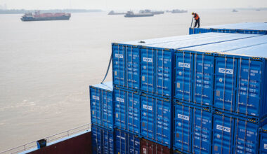 A barge loaded with containers at Yangluo Port on the Yangtze River, in Wuhan, China.