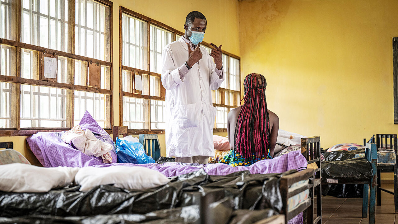 A patient and a doctor in Mpox treatment centre in Sierra Leone