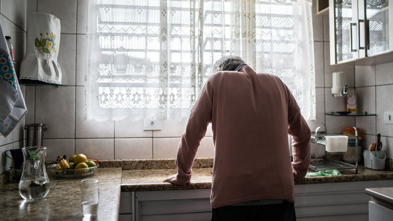 Senior man feeling pain at home