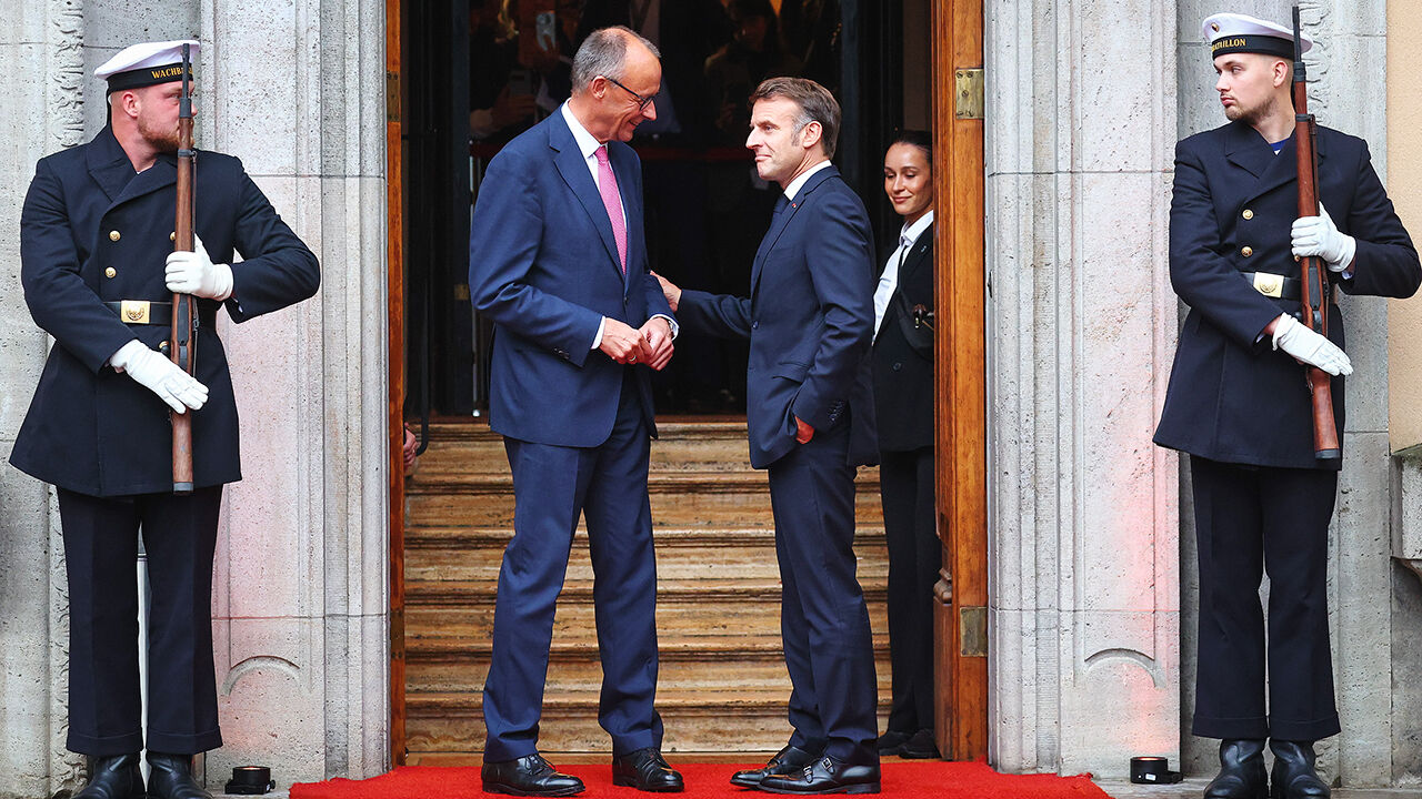 German Chancellor Friedrich Merz welcomes French President Emmanuel Macron prior to talks in Berlin