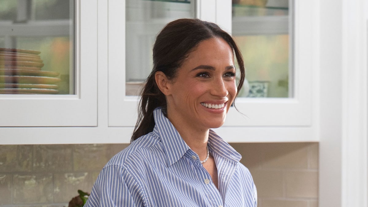 Meghan Markle rocks skinny jeans in 'elevated' look for barefoot beach stroll in unseen photos