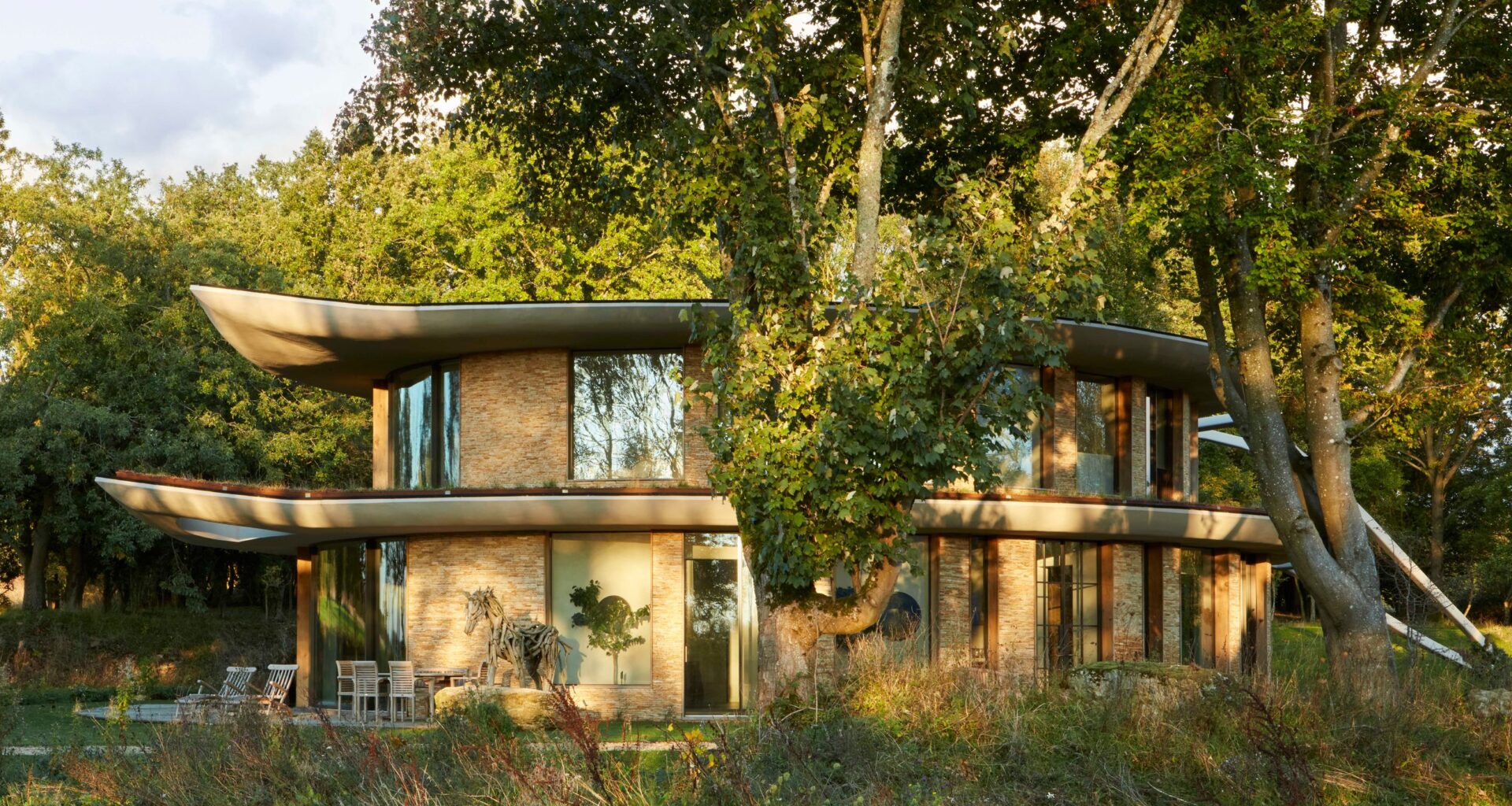 An unusual leaf-shaped house hidden away in the Cotswold countryside