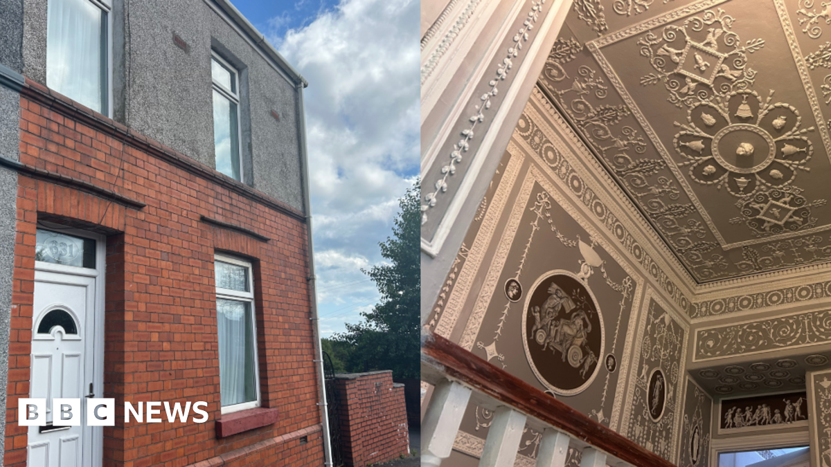 A composite image shows the exterior and interior of a home. On the left is a photo of the red-brick, two-storey end of terrace house, it has a white PVC door and is pebble-dashed on the second floor. There are blue skies with some cloud in the background of the image. On the right, the upstairs landing's ceiling is painted grey with intricate white neoclassical plasterwork patterns. A white bannister with a brown rail can be seen in the foreground of the image.