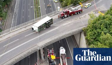 Tractor falls from bridge on to M20 leaving driver critically injured | Road transport