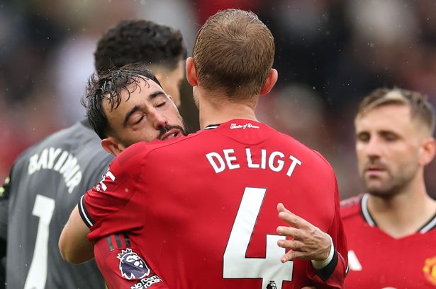 Fernandes and De Ligt embrace at full-time