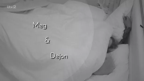 Meg and Dejon in bed 