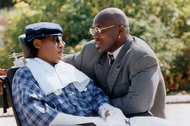 Marlon Thomas  and Vernon Walker, April 2002