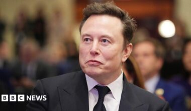Elon Musk listens as US President-elect Donald Trump addresses a House Republicans Conference meeting at the Hyatt Regency on Capitol Hill on November 13, 2024 in Washington, DC.
