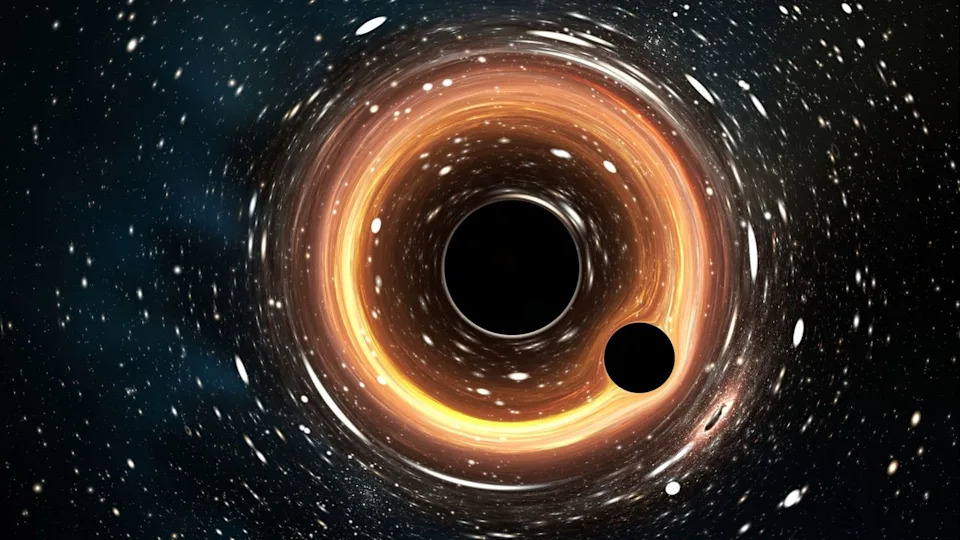  An illustration of a small black hole orbiting around a supermassive black hole exhibiting a gravitational lensing effect. 
