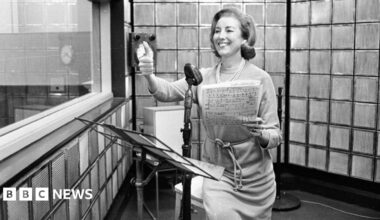 A black and white picture of British singer Vera Lynn rehearsing her new radio show