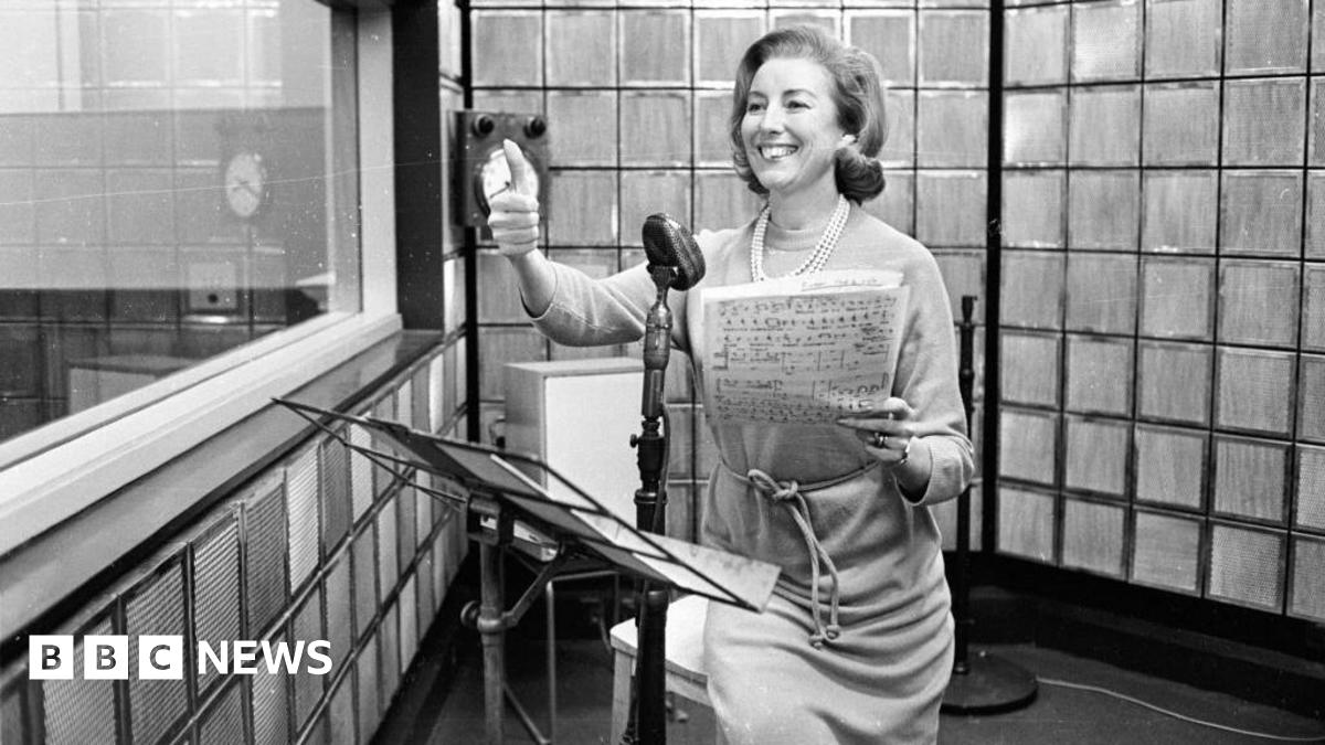 A black and white picture of British singer Vera Lynn rehearsing her new radio show