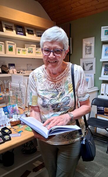 May Moran, Crossna enjoys a quick look at 'Remembering Home' by Christy Wynne. Pic: Noreen Gaffney 