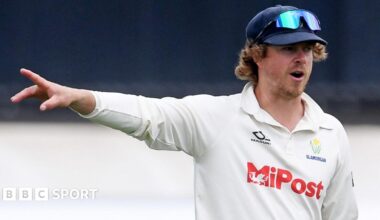 Sam Northeast points with his hand and gives instructions during a game