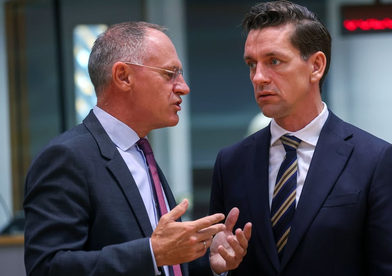 Danish minister of immigration and integration Kaare Dybvad (right) in conversation with Austrian interior minister Gerhard Karner. Photograph: Olivier Hoslet
