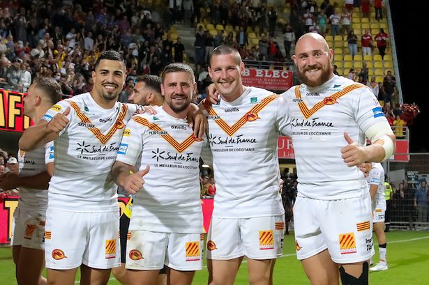Catalans' Fouad Yaha, Michael McIlorum, Joel Tomkins and Gil Dudson celebrate their 2021 Super League semi-final win over Hull KR.