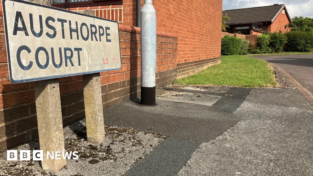A street sign for Austhorpe Court.