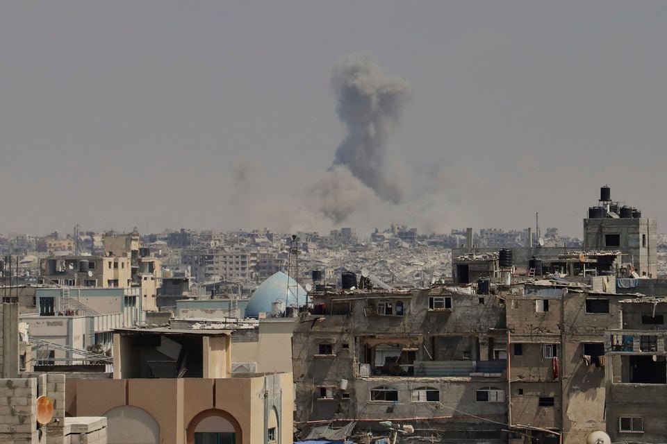 Smoke rises following an Israeli military strike in the Gaza Strip yesterday. Photo: AP