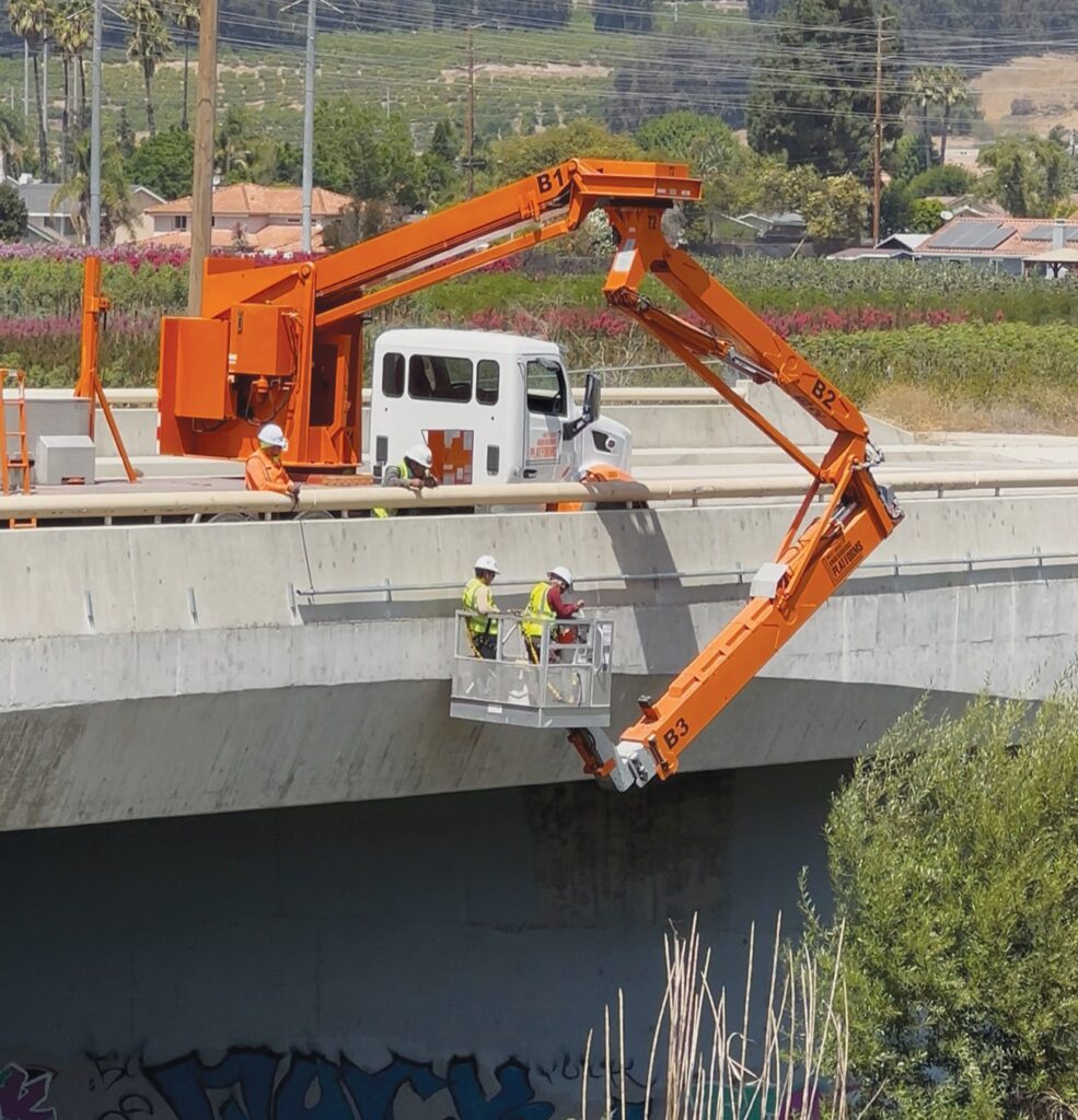 FIBER OPTICS—Aspire’s construction in Moorpark began in late May. At right, a worker is “microtrenching” in a street, installing fiber-optic cables in narrow, shallow trenches cut into streets or sidewalks. Courtesy photos