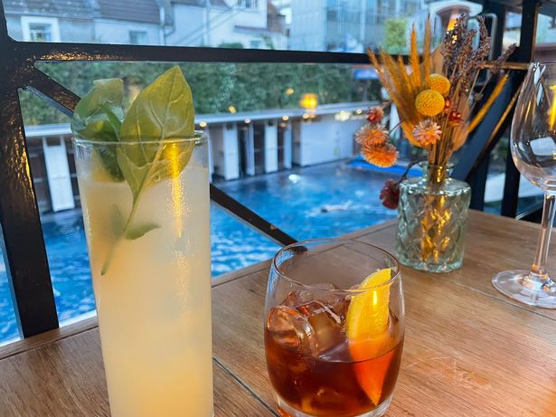 Our cocktails with a pool view