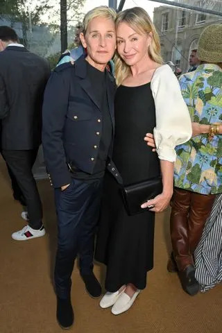 Getty Images Ellen DeGeneres and Portia de Rossi in England in 2023