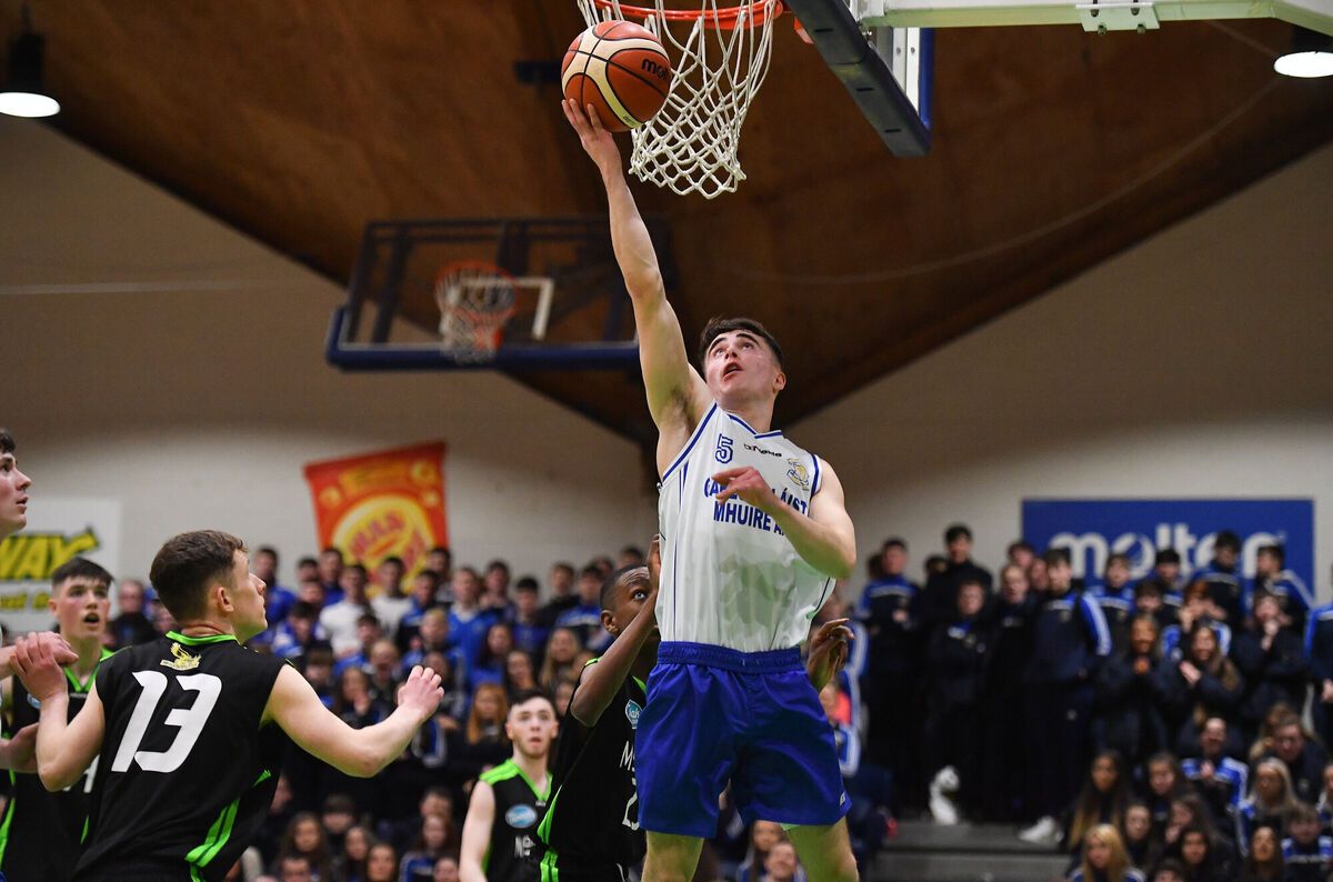 Scott Hannigan of Gael Cholaiste Mhuire in action against James Fernane of Mercy Mounthawk during the Subway All-Ireland Schools Cup U19 A Boys Final match between Mercy Mounthawk and Gael Cholaiste Mhuire AG at the National Basketball Arena in Tallaght, Dublin. Photo by Brendan Moran/Sportsfile