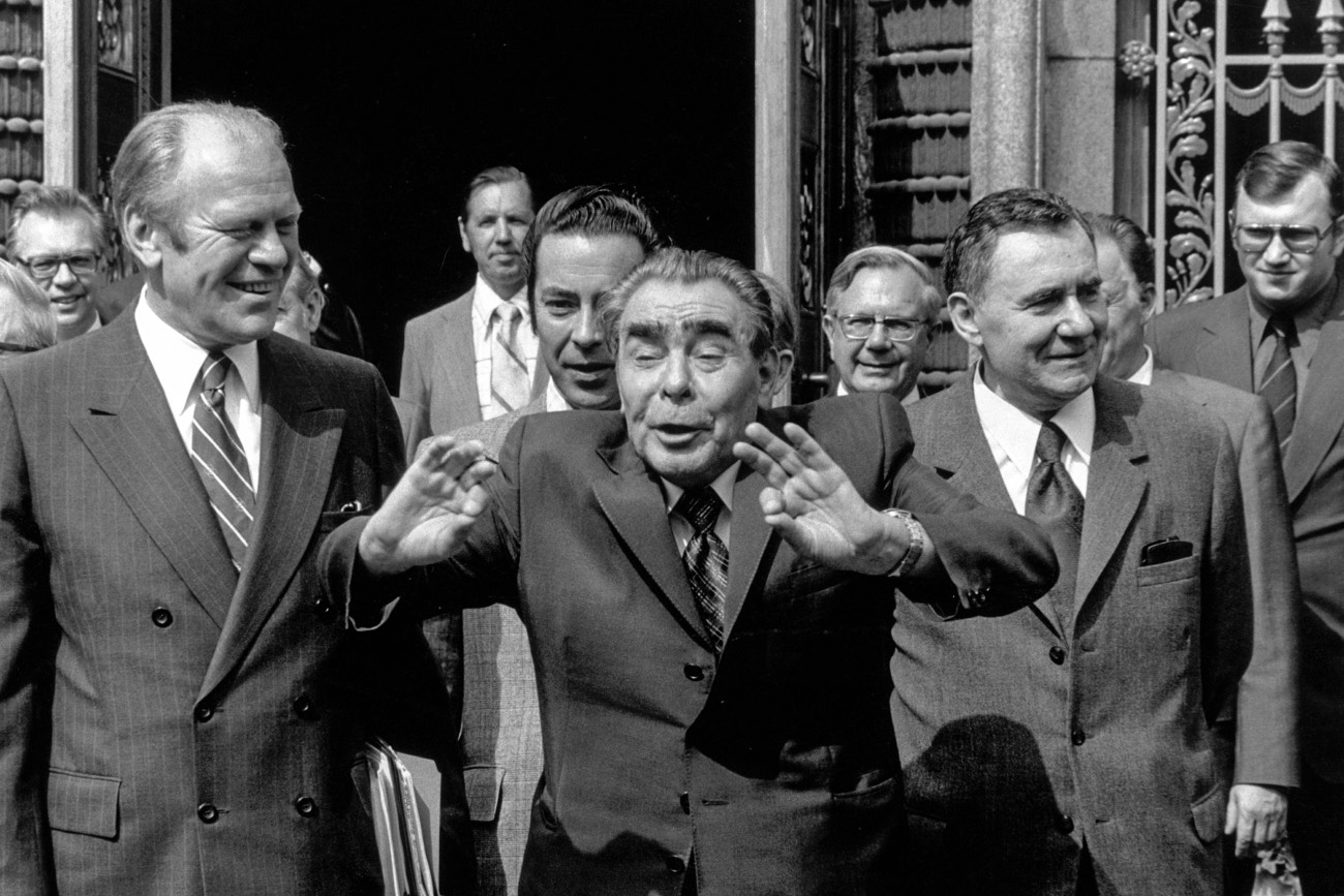 from left, US President Gerald Ford, Soviet President Leonid Brezhnev and Soviet Prime Minister Andrei Gromyko, walk in front of the Soviet embassy in Helsinki during the CSCE 1975 conference.