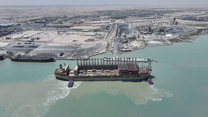 Karadeniz Powership Orhan Ali Khan, a floating power plant, docked at the port of Umm Qasr in Basra, Iraq. (Reuters)