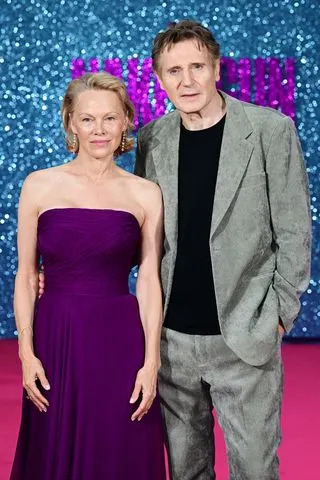 Anthony Harvey/Shutterstock Pamela Anderson and Liam Neeson on July 22, 2025
