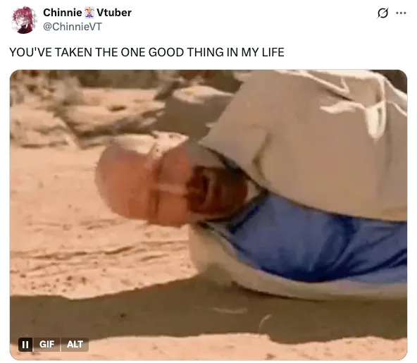 A man lies on the ground in distress, wrapped in a blanket. Text above reads, "YOU'VE TAKEN THE ONE GOOD THING IN MY LIFE."