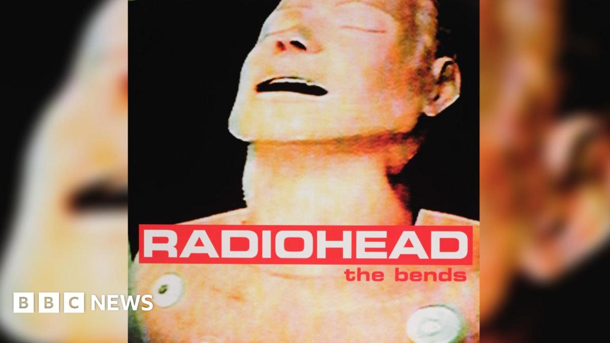 The album cover for Radiohead's 1995 album 'The Bends' is a pixelated head and shoulders image of, what looks like, a topless man with his eyes closed, mouth open and head tilted back.  "RADIOHEAD the bends" is printed along the bottom third of the image in red and white.