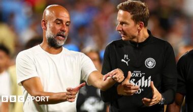 Pep Guardiola and Pep Lijnders talk to each other