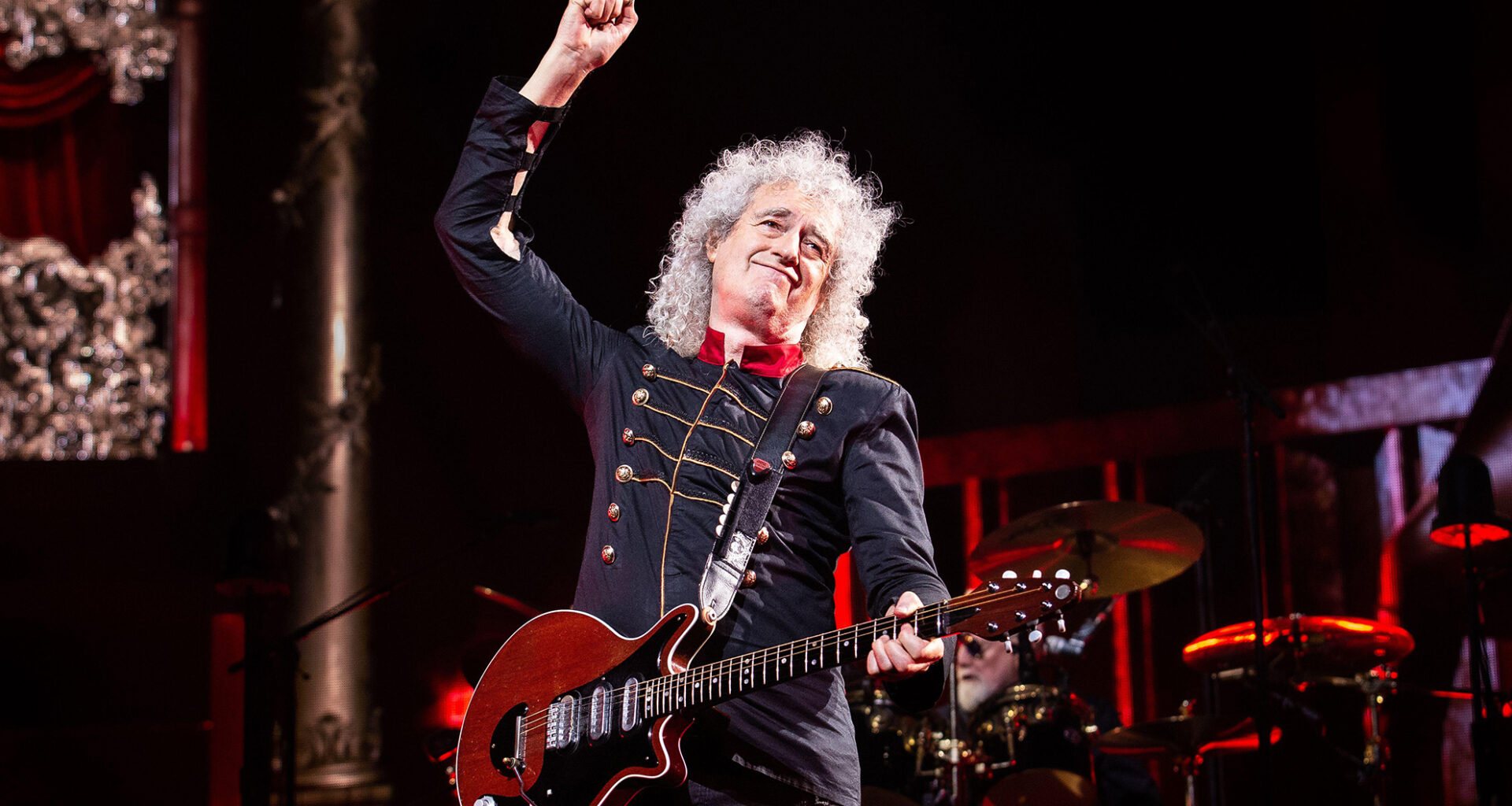 Brian May performs with Queen in 2022