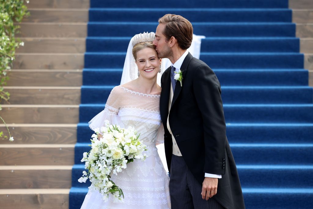 Princess Marie Caroline of Liechtenstein and Mr. Leopoldo Maduro Vollmer posing together after their wedding ceremony