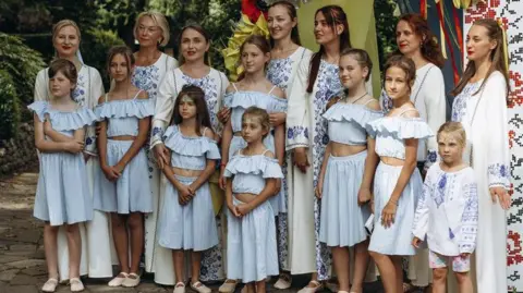 Anastasiia Moskalenko Women and girls dressed in white at 2024's UkraineFest