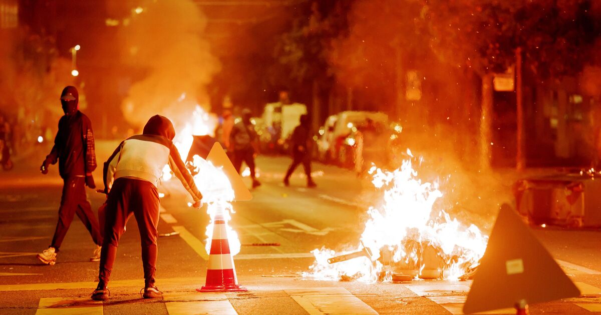 Police face second night of riots after migrant killed | World | News