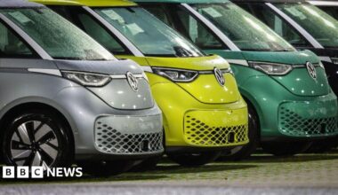 New VW ID Buzz vehicles, fully electric-driven microbus from Volkswagen Commercial Vehicles, are seen parked next to the commercial vehicle plant of German car manufacturer Volkswagen.