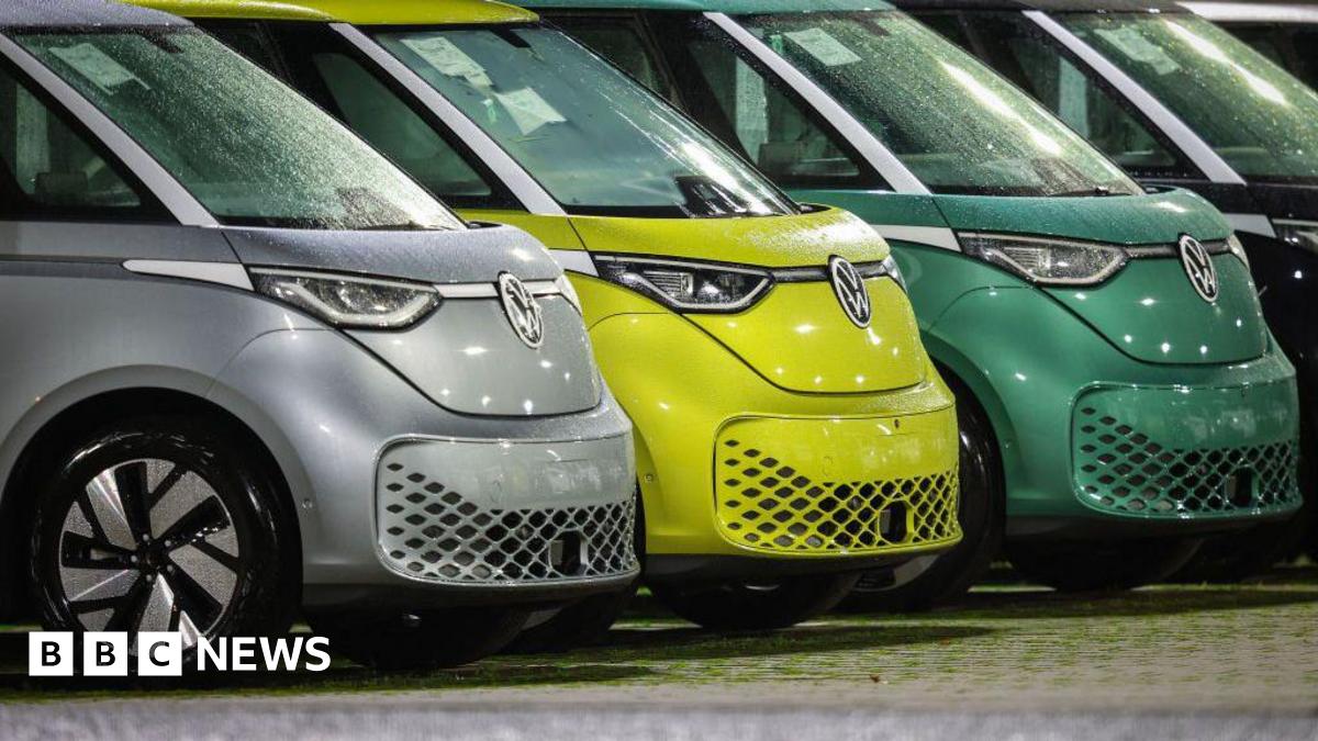 New VW ID Buzz vehicles, fully electric-driven microbus from Volkswagen Commercial Vehicles, are seen parked next to the commercial vehicle plant of German car manufacturer Volkswagen.