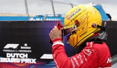 Lewis Hamilton adjusts his helmet visor after retiring form the Dutch Grand Prix