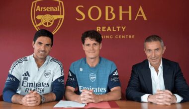 Christian Norgaard signing for Arsenal (Photo via Arsenal.com)