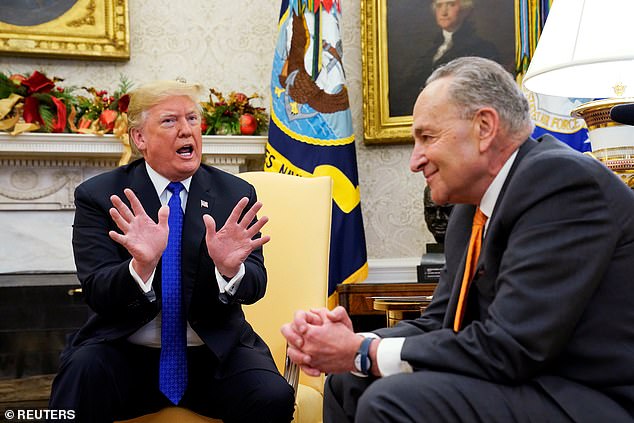 President Donald Trump detonated a high-stakes Senate negotiation with an outburst on social media on Saturday night telling Senate Minority Leader Chuck Schumer to 'GO TO HELL' (File photo from December 2018 during Trump's first term)