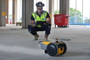 Cal Say and a robot which is helping with construction.The Royal Shrewsbury Hospital. Photo: Steve Leath