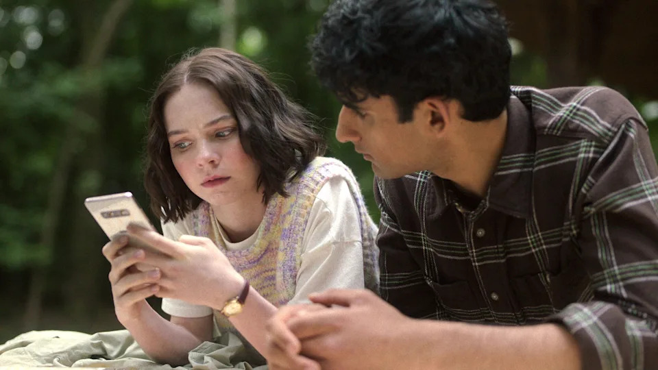Emma Myers (with Zain Iqbal) stars as teen detective Pip Fitz-Amobi in the Netflix mystery "A Good Girl's Guide to Murder."
