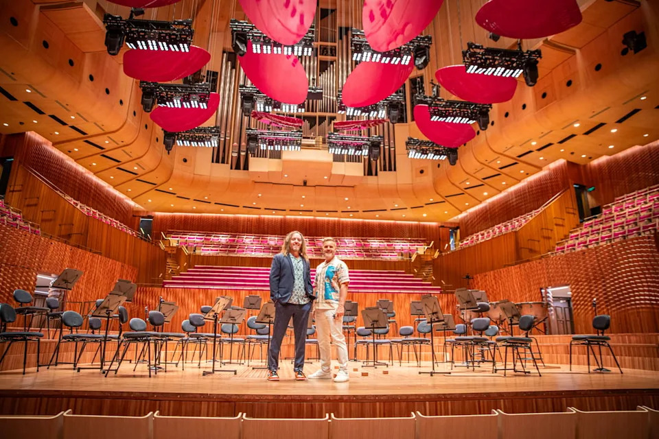 Tim Minchin with Gary Barlow on stage at the Sydney Opera House (ITV)