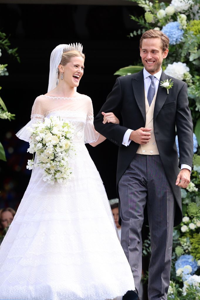 Princess Marie Caroline of Liechtenstein and Mr. Leopoldo Maduro Vollmer leaving their wedding and smiling widely