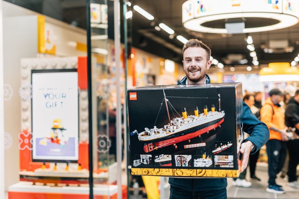 Lego fan Adam Brown was one of the first customers in the store and purchased the Iconic Titanic set from the home of Titanic in Belfast.
