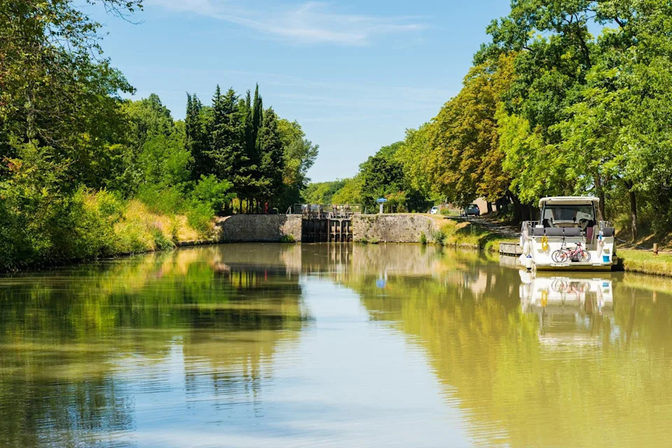Visitors can cycle along the shaded waterways of the Canal du Midi (Getty Images)