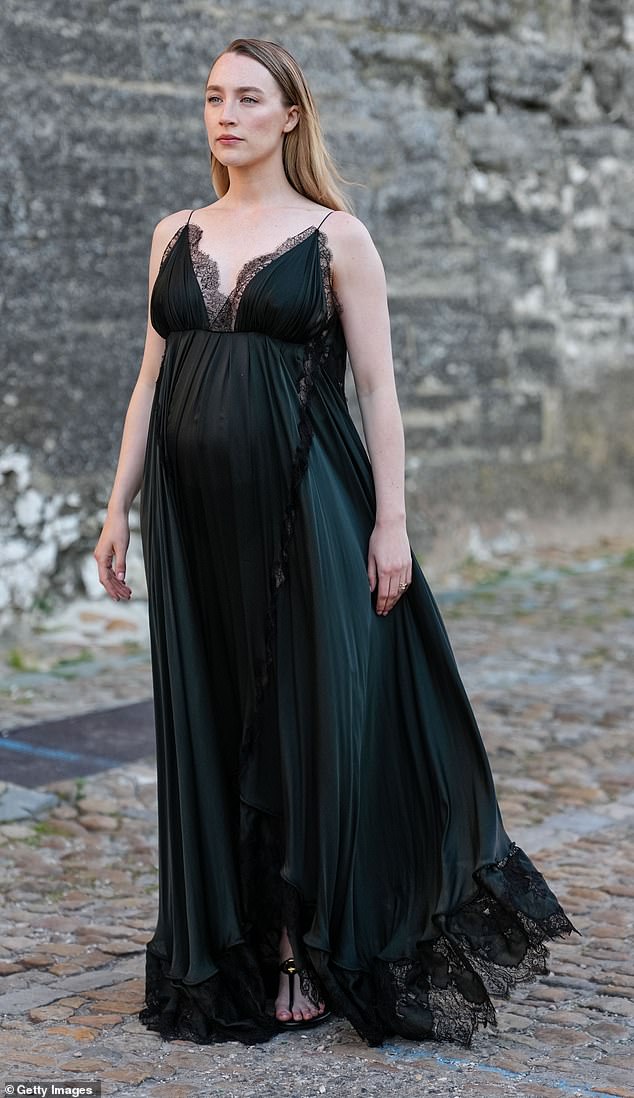 Saoirse's pregnancy came to light when she debuted a baby bump at the Louis Vuitton Cruise 2026 at PFW in May before being confirmed by various outlets