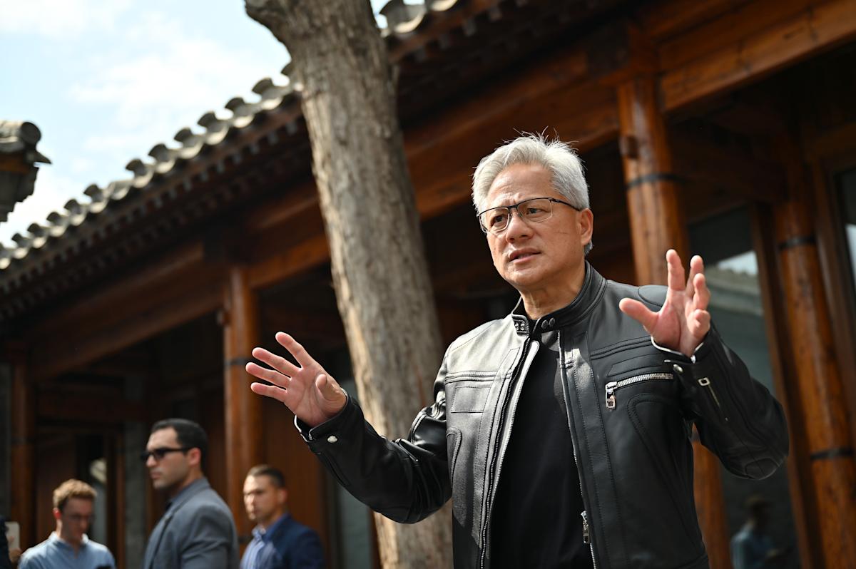 Wall Street flat and FTSE rises as Nvidia and AMD agree to pay US 15% cut of China chip sales - uk.finance.yahoo.com