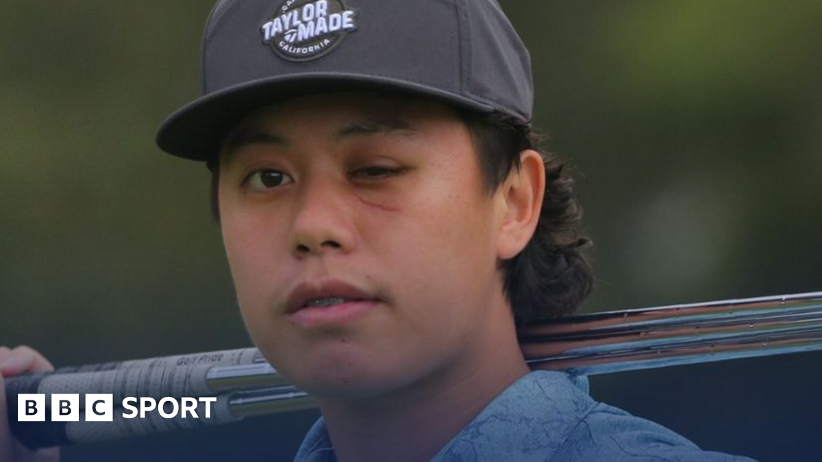 Jeffrey Guan poses with a golf club