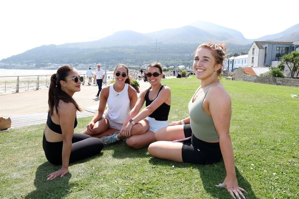 From left: Sandra Pham, Chloe Gordon, Poppy Davis and Taylor Davis, all from Portadown in Newcastle, Co Down, enjoying the warm weather